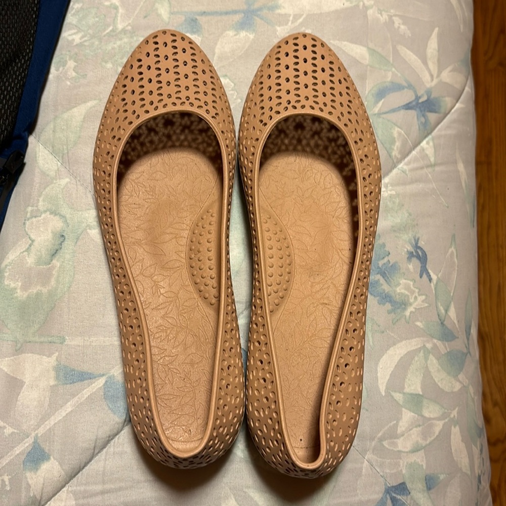 Tan flats with a fun pattern, never worn